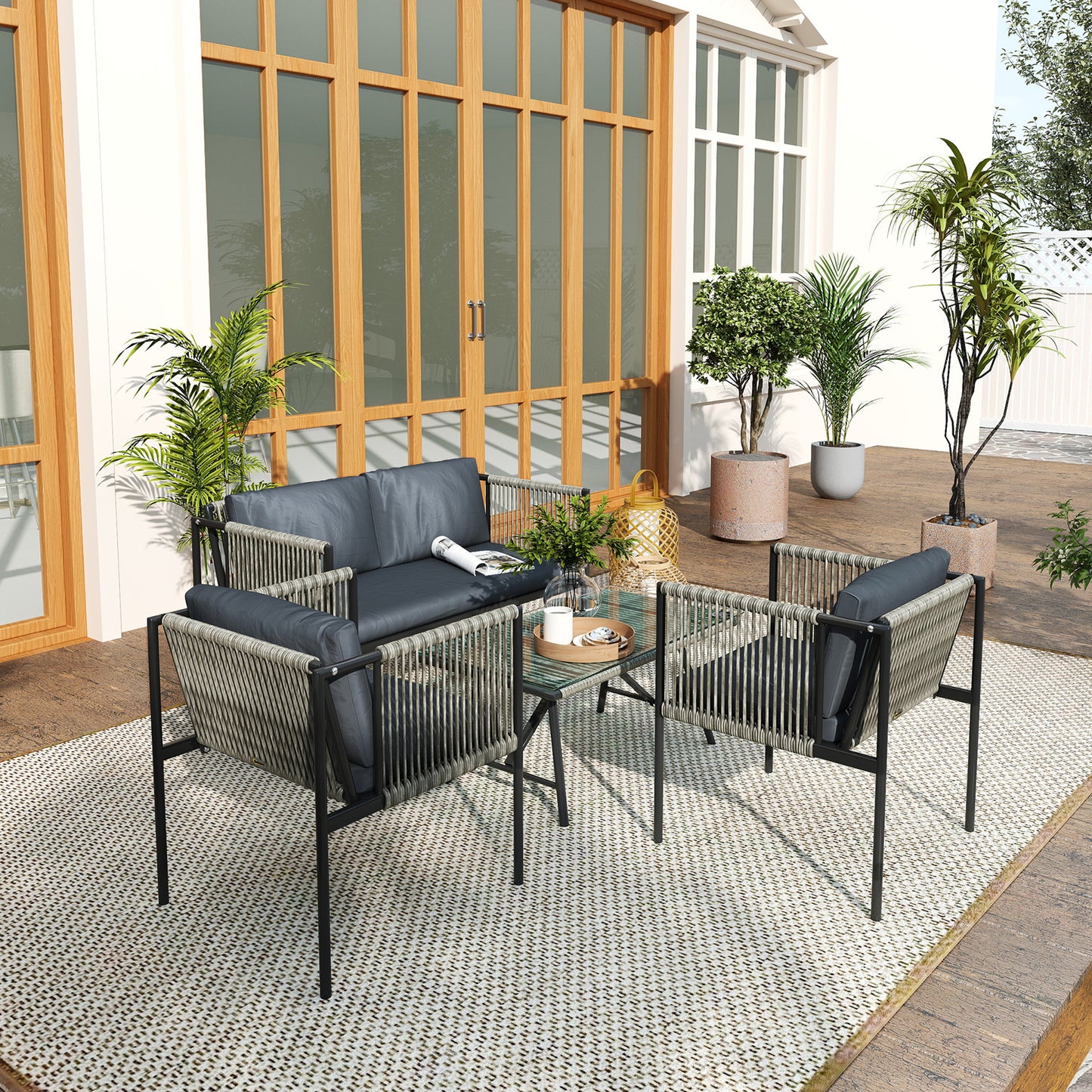 Outsunny 4-teiliges Gartenmöbel-Set, 1 Sofa, 2 Sessel, 1 Tisch mit Glasplatte, Kissen, Stahlrahmen, Kunststoff-Rattan, Grau